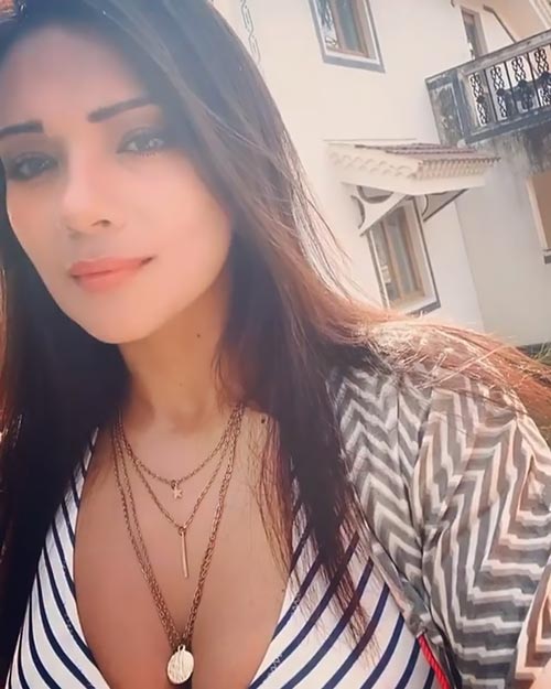 megha 7 - Megha Gupta sets temperature soaring with her ample cleavage show in bikini top - see now.