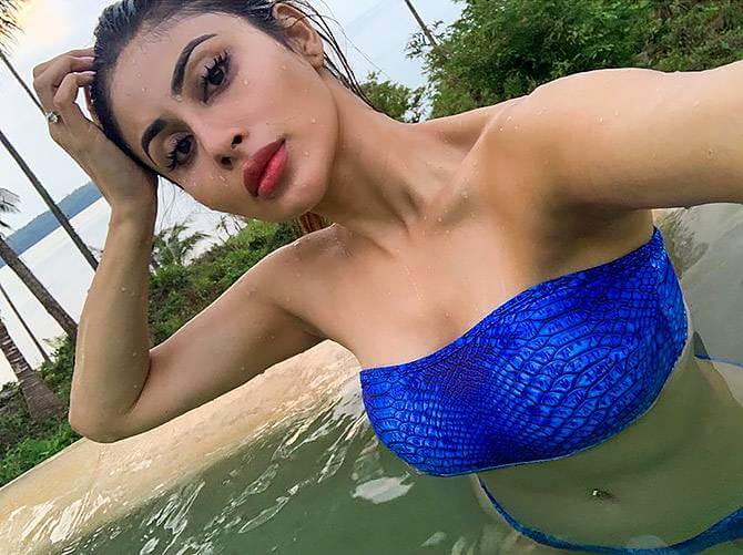 mouni roy hot pictures in blue bikini clicking selfie in pool - Mouni Roy Bikini Photos | Hot Mouni Roy Bikini Swimsuit Pics Shows Off Her Toned Body