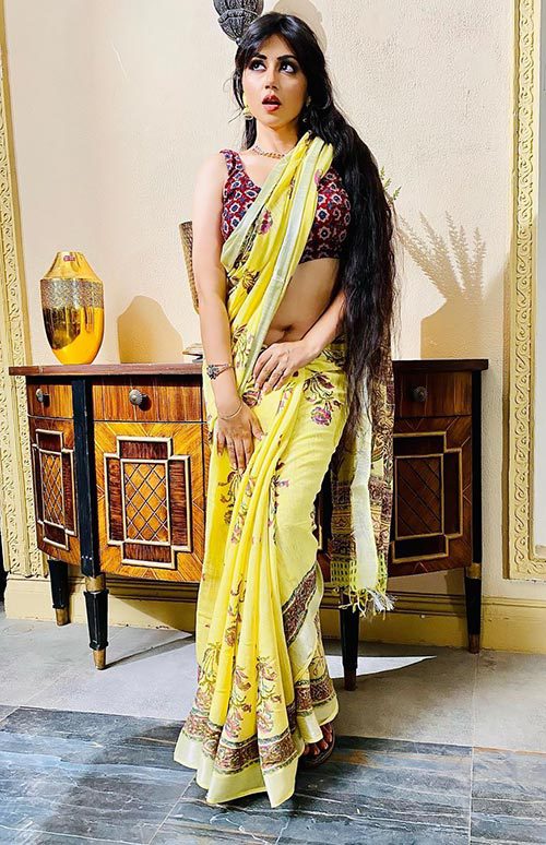 reema 32 - Kasautii Zindagyy Kay actress, Reema Worah, raises heat in this yellow saree with sleveeless blouse.