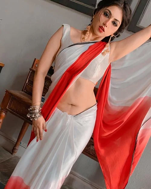 reema worah navel white saree actress 5 - Reema Worah's dance in saree - the actress continues to raise the heat with latest photos and videos.