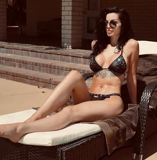 wwe 13 - WWE diva Paige shows off her sexy body in black bikini - see photos.