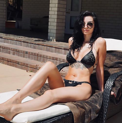 wwe 14 - WWE diva Paige shows off her sexy body in black bikini - see photos.
